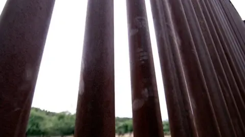 Handprints on fence