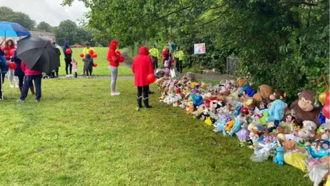 Toys and flowers have also been left at the scene