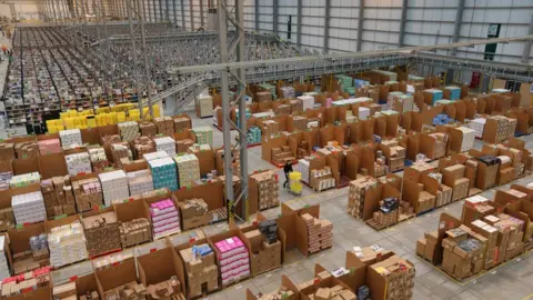 Getty Images Amazon's fulfilment centre in Peterborough, England