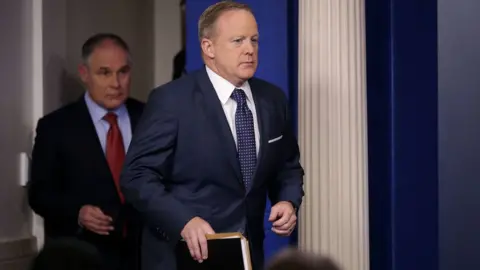 Getty Images Press Secretary Sean Spicer and EPA head Scott Pruitt enter the White House briefing room
