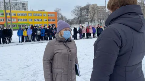 A school practises an air raid drill