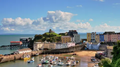 Getty Images Tenby Harbour: The Batak family love visiting the beach