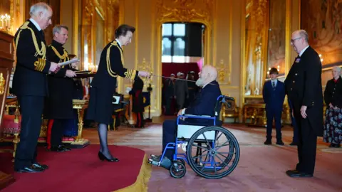 PA Sir Michael was knighted in a ceremony with the Princess Royal