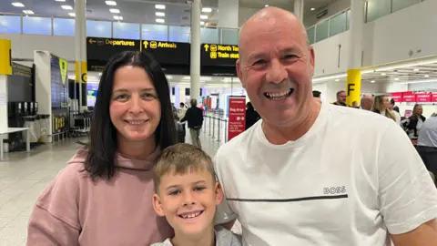 A family laughing together. 