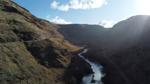 A river flowing through a valley