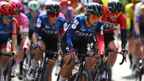 Getty Images Alessia Vigilia of Italy and Team FDJ - SUEZ leads a group through the city centre