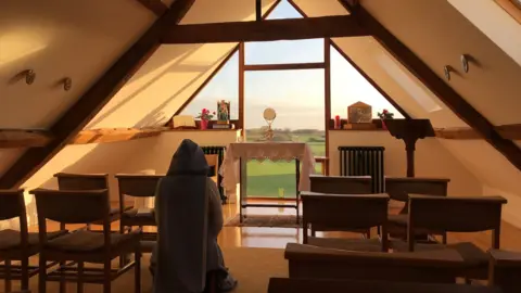 Community of Our Lady of Walsingham A sister prays in the convent chapel
