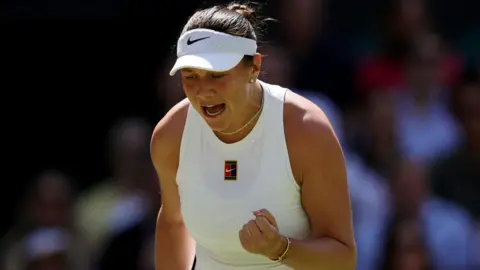American Amanda Anisimova celebrates during semi-final match against Aryna Sabalenka on Centre Court at Wimbledon