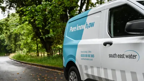 A South East Water van on a country road