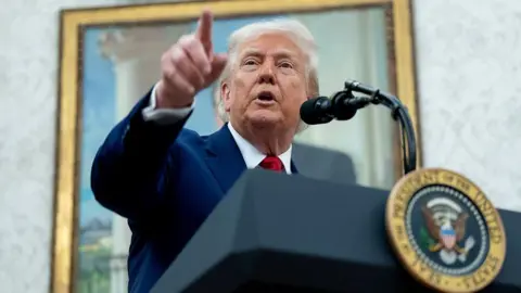 US President Donald Trump during a swearing-in ceremony for Jeanine Pirro, interim US attorney for the District of Columbia, not pictured, in the Oval Office of the White House in Washington, DC, US, on Wednesday, May 28, 2025. 
