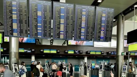 RTÉ Flight boards at Dublin airport