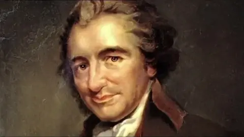 Getty Images An historic painting of a man with bouffant hair, a red jacket and white cravat