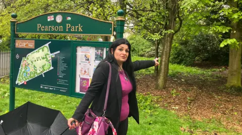 Amanda White / BBC Erica Romano points to the area where a man touched himself in full view of Pearson Park