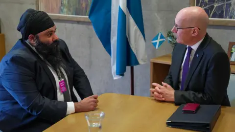 Gurpreet Singh Johal and John Swinney