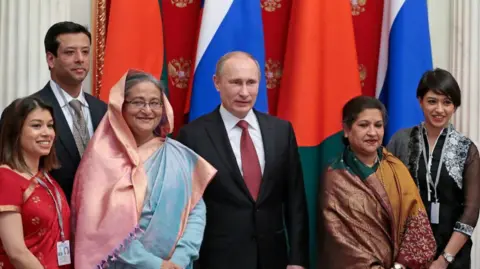 AP Tulip Siddiq (far left) pictured with Russian president Vladimir Putin and her aunt Sheikh Hasina (third left), who was then Bangladesh's prime minister