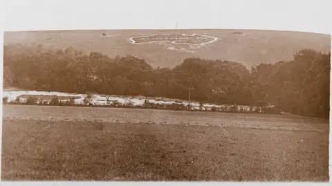 Heritage Art/Heritage Images/Getty Images A black and white postcard showing a large map of Australia carved into the chalk downs at Hurdcott Camp (Compton Chamberlayne). The postcard is dated 2 June 1917. Creator: Murphy. (Photo by Heritage Art/Heritage Images via Getty Images)
