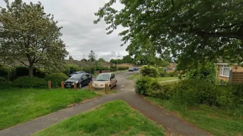 Google A Google Maps picture of Stubbs Avenue in Headington, a residential street with single storey houses.