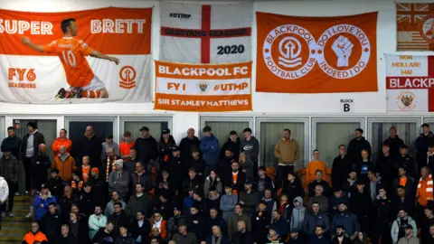 Blackpool fans and banners at a recent match