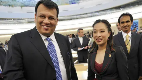 AFP via Getty Images Sri Lankan Disaster Management and Human Rights Minister Mahinda Samarasinghe (L) smiles next to Princess Bajrakitiyabha of Thailand after their speech on September 14, 2009 on the opening day of the 12th United Nations (UN) Human Rights Council session at the UN offices in Geneva