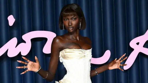 Getty  Anok Yai in a white corseted dress