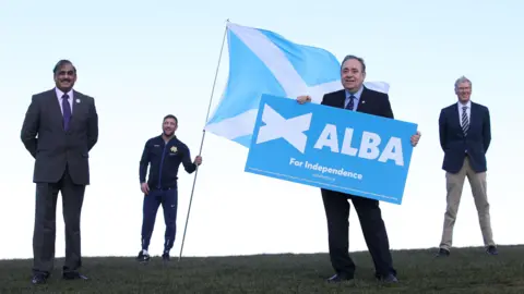 PA Media ALBA Party leader Alex Salmond (second right ALBA Lothian candidates Irshad Ahmed (left), Alex Arthur (second left) and Kenny MacAskill (right) at a photocall on Calton Hill, Edinburgh, marking the launch of the ALBA Lothian campaign for the Scottish Parliamentary election.