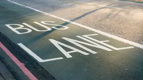 An up-close shot of a bus lane. 