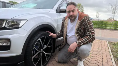 Rob Webber, 40, is trying to claim after a pothole caused £300 worth of damage to his car