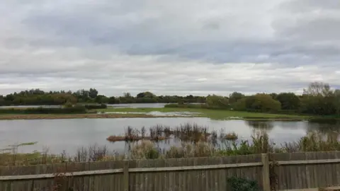 Jessica Moriarty View of flooding from a resident's garden towards the proposed quarry site