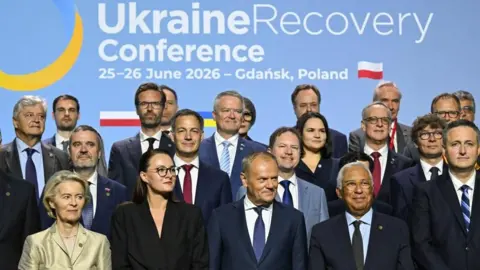 EPA Polish Prime Minister Donald Tusk (C), European Commission President Ursula von der Leyen (L), European Council President Antonio Costa (2R), and Ukrainian Prime Minister Yulia Svyrydenko (2L) pose for a group photo at the opening session of the Ukraine Recovery Conference 2026 at the European Solidarity Centre in Gdansk, Poland, 25 June 2026.