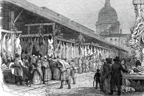 Getty Images From "Illustrated London News", 1845. Haunches of meat for sale at a London street market 