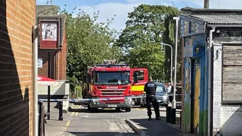 A cordon around the scene of a fire