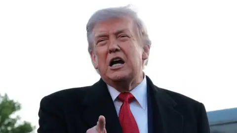 US President Donald Trump speaks to reporters Lincoln Memorial Reflecting Pool in Washington DC.