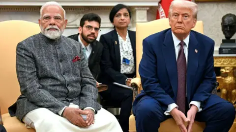 AFP via Getty Images) US President Donald Trump speaks with the press as he meets with Indian Prime Minister Narendra Modi in the Oval Office of the White House in Washington, DC, on February 13, 2025. (Photo by Jim WATSON / AFP) (Photo by JIM WATSON/AFP via Getty Images)