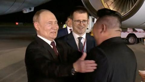 Putin meets Kim at airport