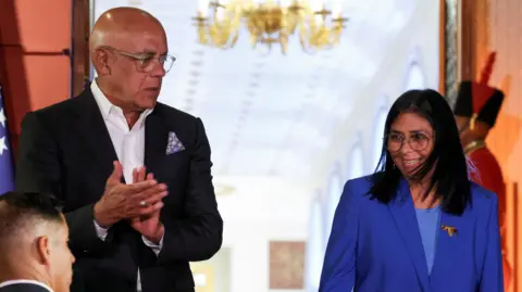 Venezuelan Interim President Delcy Rodríguez and her brother National Assembly President Jorge Rodríguez 