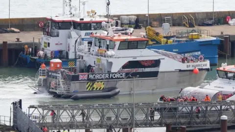 PA Media Groups of people thought to be migrants are brought in to Dover, Kent, onboard Border Force vessels following a number of small boat incidents in the Channel