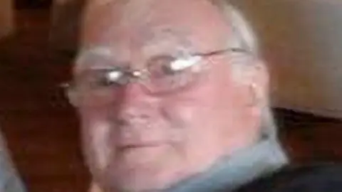 A blurry photograph of 74-year-old Barry Spooner, who 