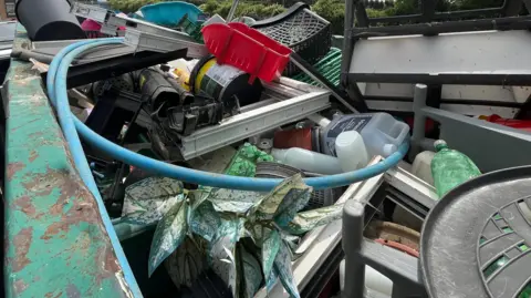 Large container filled with plastics for recycling