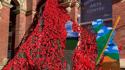 Poppy display for Remembrance Day at Grantham's Guildhall Arts Centre
