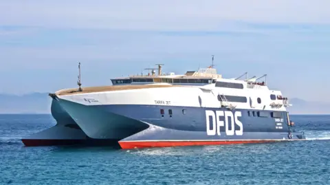 The large blue and white from DFDS Tarifa Jet ship