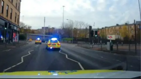 View from a police car dash cam of a police pursuit in Glasgow