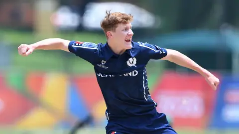 Liam Naylor celebrates taking the wicket of Pakistan batter Haider Ali at the 2020 U19 Cricket World Cup