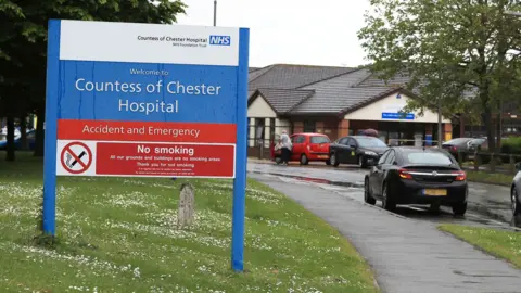 Signage is seen outside an entrance to the Countess of Chester Hospital in Chester