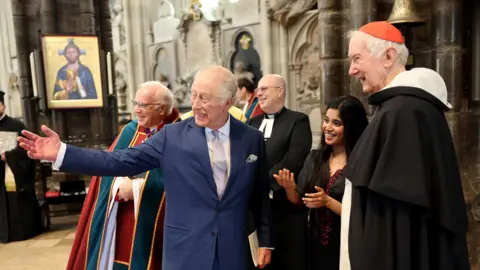 PA Media King Charles at an advent service in Westminster Abbey with an icon on display