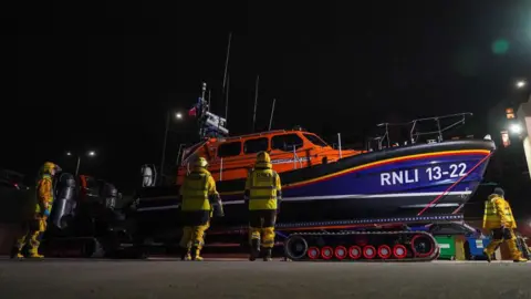 Getty Images The Royal National Lifeboat Antony Patrick Jones returns safely with crew to Bridlington RNLI station after taking part in rescue operations after two vessels collided in the North Sea on March 10, 2025 in Bridlington, England. 