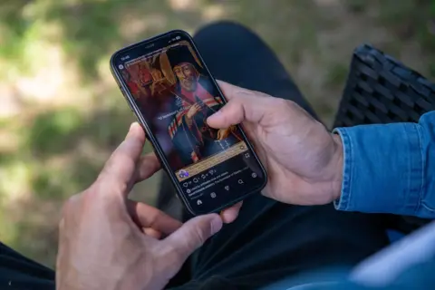BBC/Emma Lynch Phone screen showing an Instagram reel