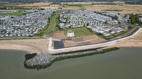  Environment Agency Image of the sea and homes and businesses on the coast line