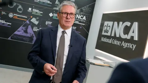 PA Media Prime Minister Sir Keir Starmer speaks during an interview with the BBC during a visit to the National Crime Agency (NCA) headquarters in London