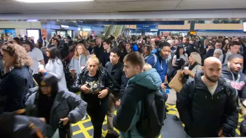 Commuters in Euston station 