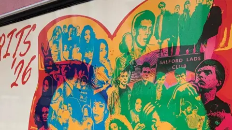 A colourful collage of Manchester bands, including Oasis, on a wall poster in Manchester